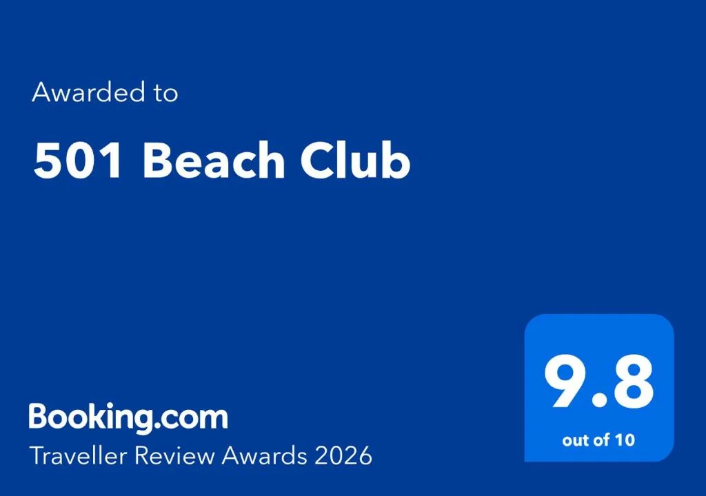 Booking.com award certificate for 501 Beach Club with 9.8 rating