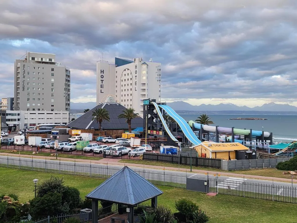 Panoramic ocean and mountain view from apartment overlooking Mossel Bay beachfront