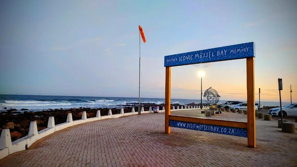 Mossel Bay coastal promenade with ocean views and iconic Mossel Bay Memory arch