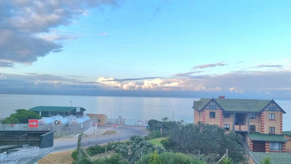 Serene ocean and sky view from property overlooking Mossel Bay coastline