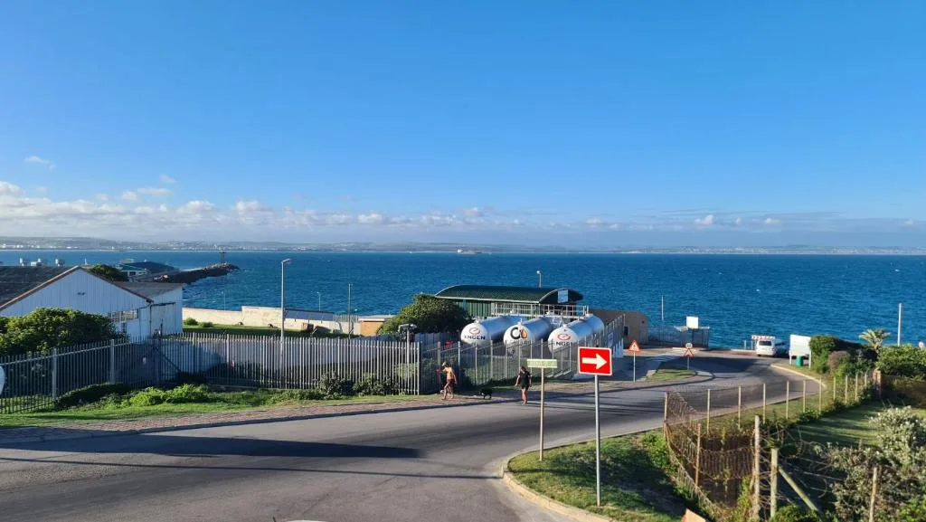 Scenic coastal view of Mossel Bay with ocean, ships, and blue horizon