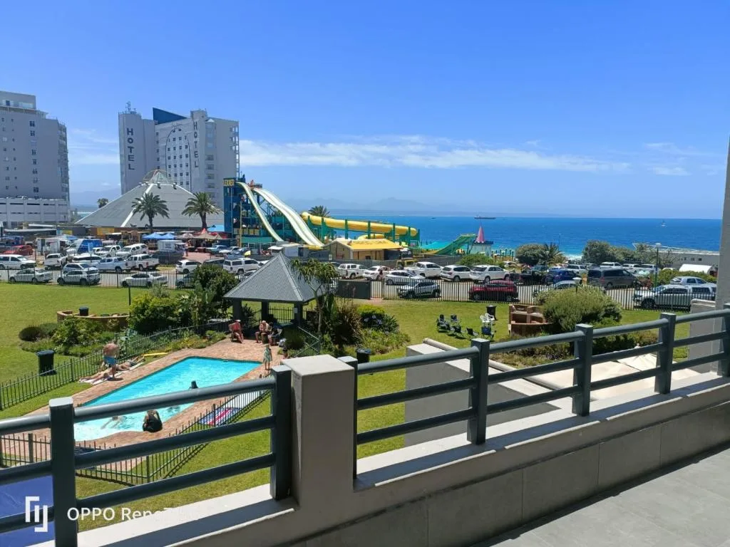 Ocean view from deck overlooking pool and beachfront attractions