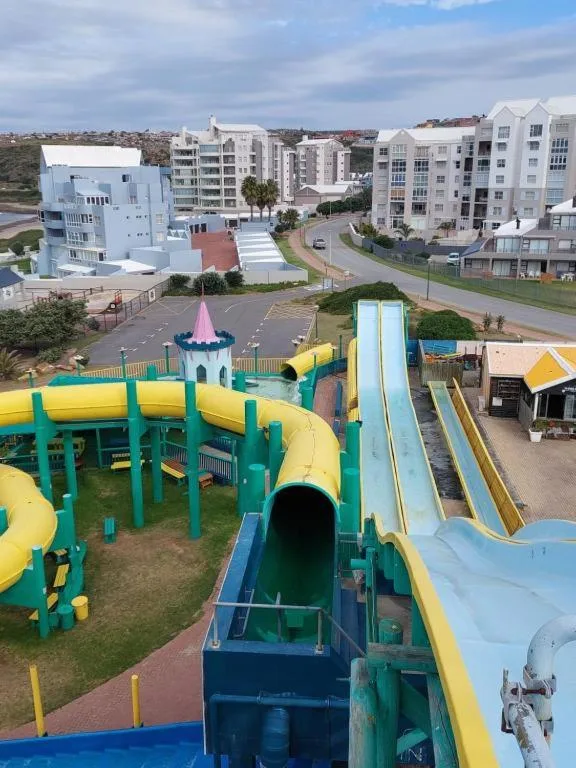Aerial view of Mossel Bay suburb with apartment buildings and playground