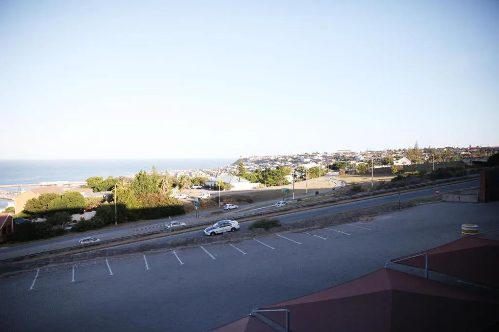 Scenic coastal view overlooking Mossel Bay beach and town with ocean