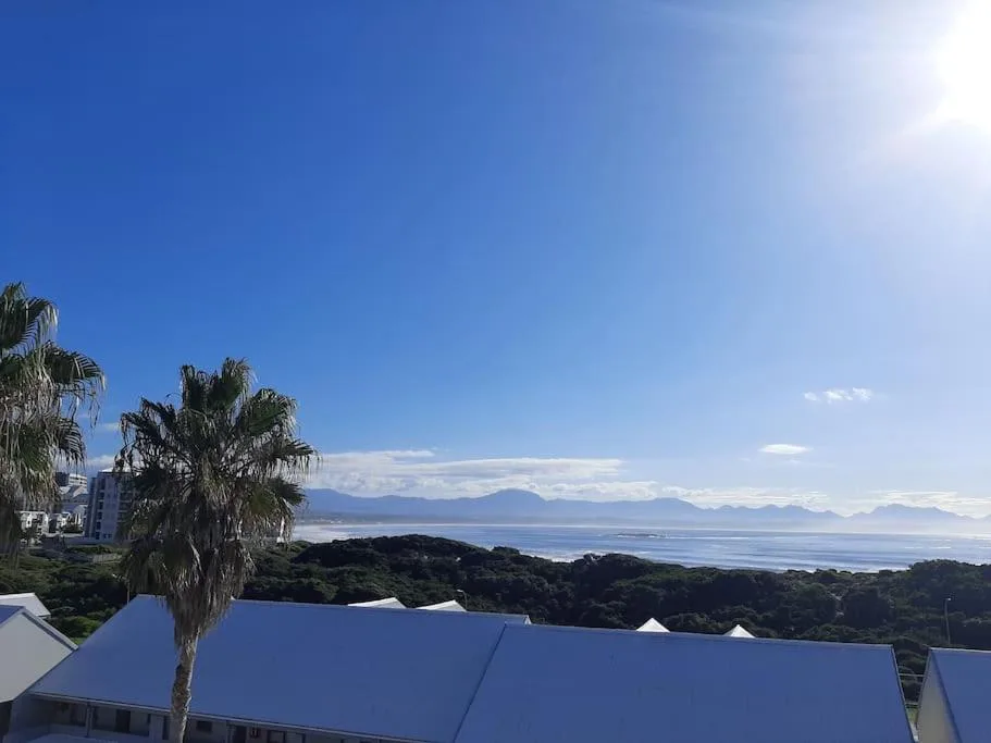 Scenic ocean and mountain vista from property overlooking Mossel Bay coastline