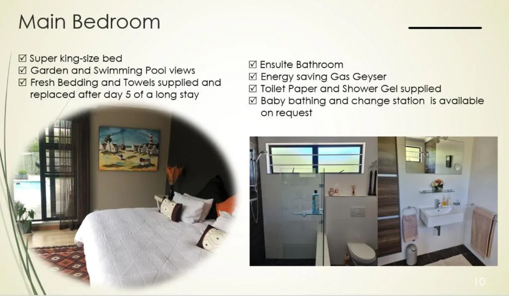 Spacious main bedroom with super king-size bed and pool views through glass doors