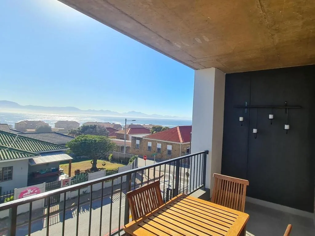 Coastal view from balcony overlooking Mossel Bay and mountains