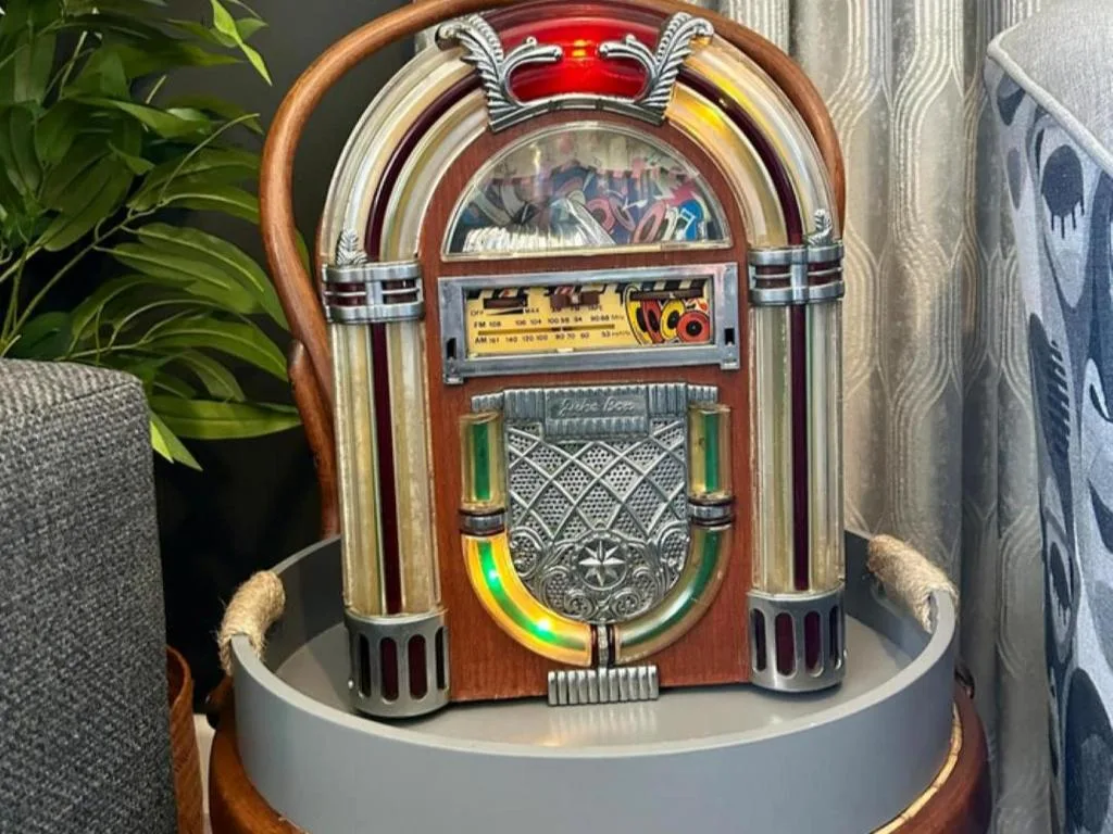 Vintage jukebox with wooden frame and colorful retro design elements