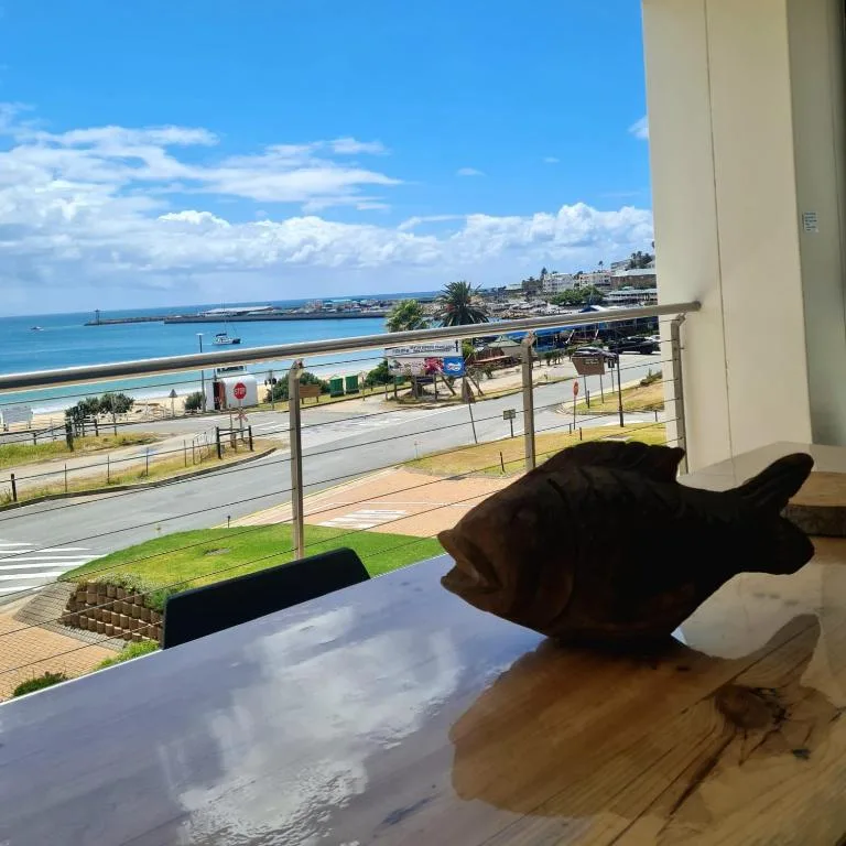 Stunning coastal view of Mossel Bay beach and ocean from apartment balcony