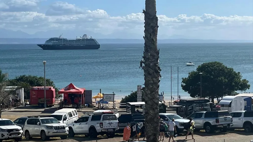 Ocean view with cruise ship and beach activity from property vantage point