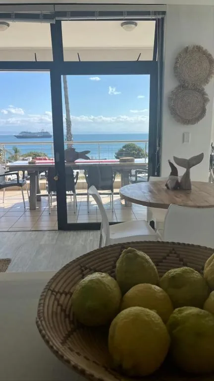 Ocean and coastal views through large windows overlooking Mossel Bay waters