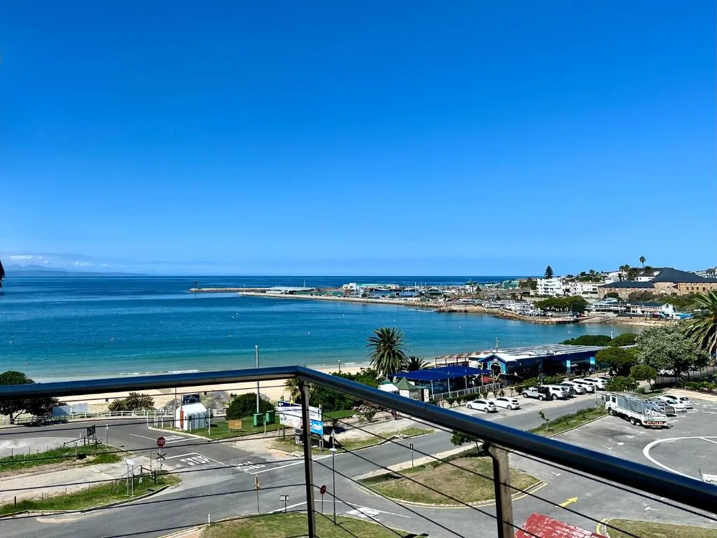 Stunning coastal view of turquoise ocean and beach town below