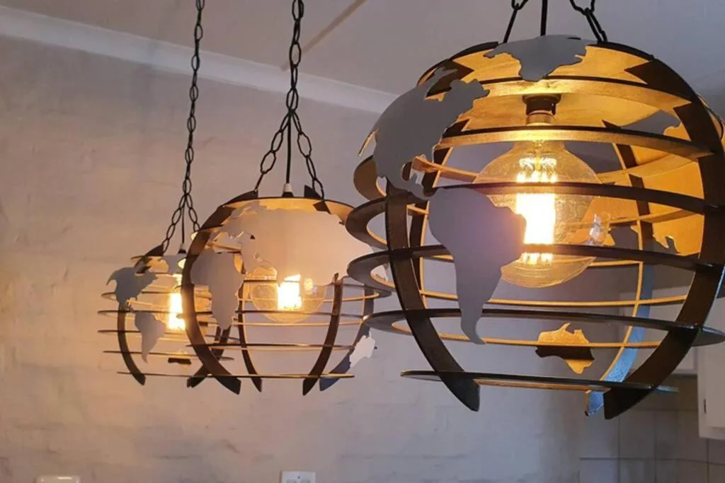 Decorative hanging pendant lights with warm glowing bulbs indoors