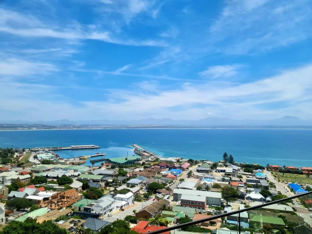 Panoramic coastal view of Mossel Bay with turquoise ocean and distant mountains