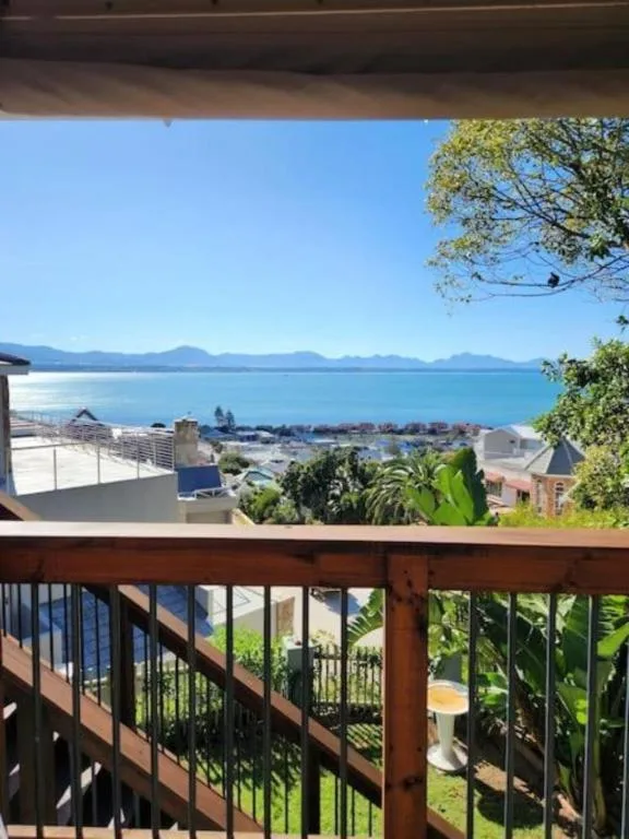 Stunning ocean and mountain views from the property's deck overlooking Mossel Bay