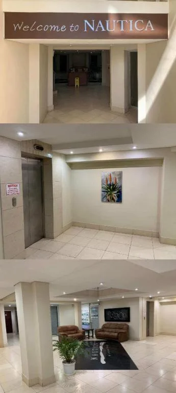 Welcome signage and interior hallway views of Nautica apartment building